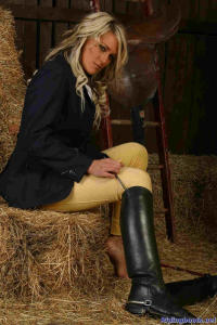 blond girl Diana posing in the stable 1