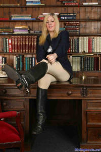 blond teenage girl stripps off her riding dress 3