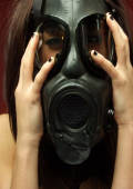 gas mask slut shows erect nipples