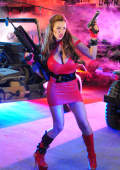 action girl Jordanwith heavy gun in blue and red light settings