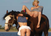 Cute girls are sharing a horse fore nude horsback riding